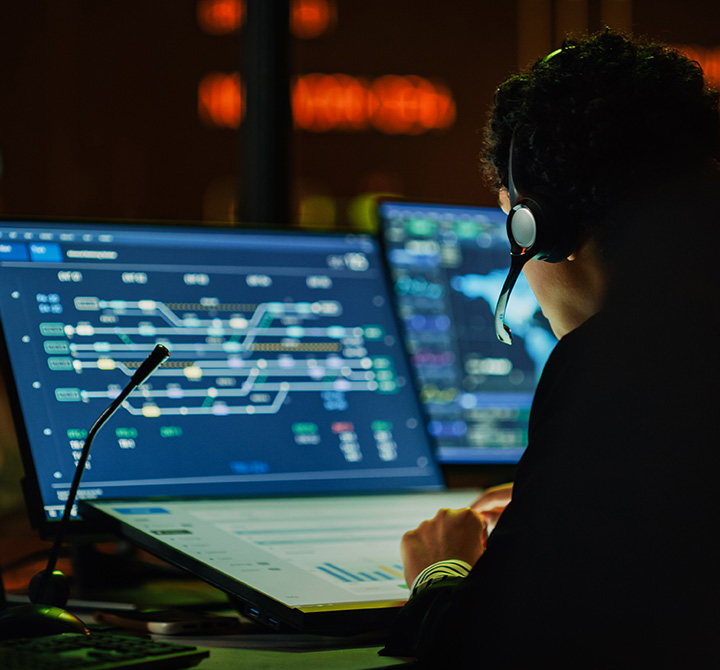 Company associate working in an operations control center